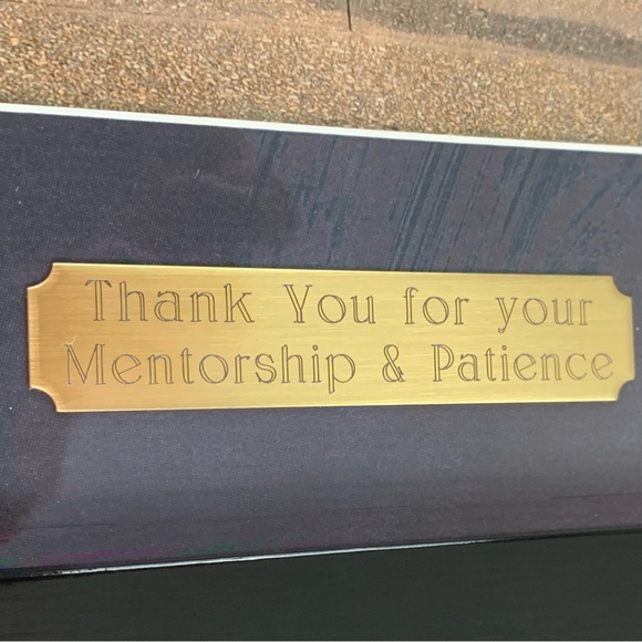 A Photo Of A Ceremony Honoring Mentorship and Patience. - Picture 4 of 5